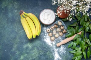 Homemade Hair Mask : DIY Recipes For All Hair Type Concer top view white flour with bananas eggs dark blue background dough food pastry oven cake pie dust bake
